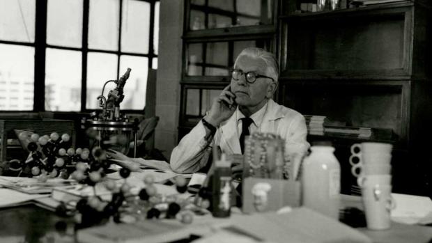 Herman Mark at desk; photo credit: Poly Archives
