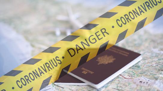 Yellow caution tape over passports