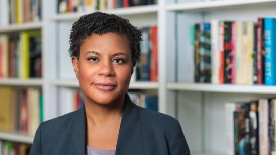 Dr. Alondra Nelson in front of a bookcase