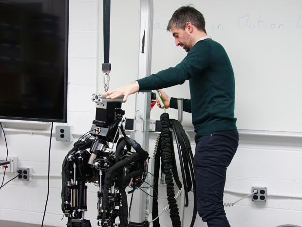 Professor  Righetti working in robotics lab