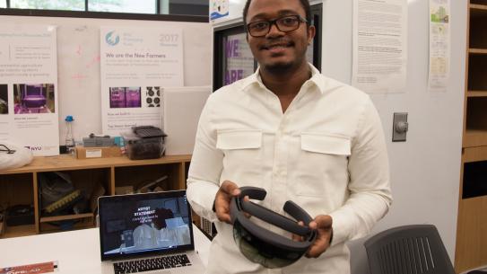 Levi Mollison ('17 B.S Integrated Digital Media) with his project, part of the Microsoft HoloLens Design Challenge.