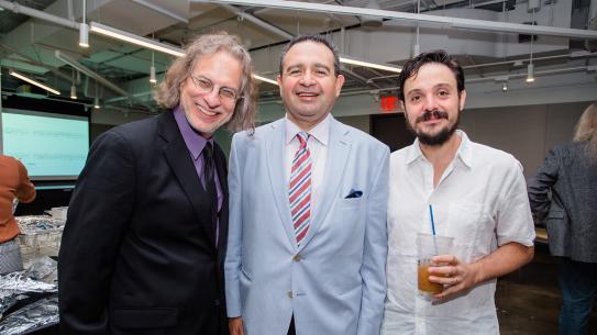 Faculty members and administration gather in the NYU Tandon Markerspace before convocation