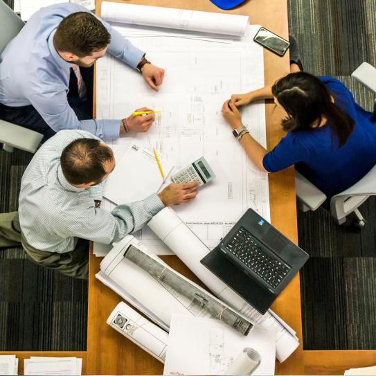 top view of people discussing plans top view of people discussing plans