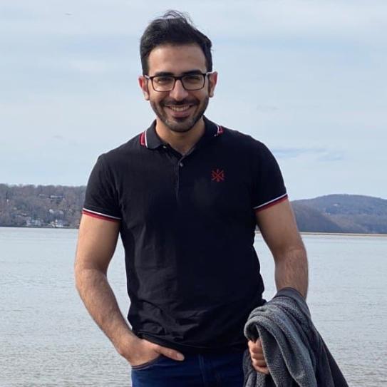 A photo of Sarmad Mehrdad with Hudson river in the background